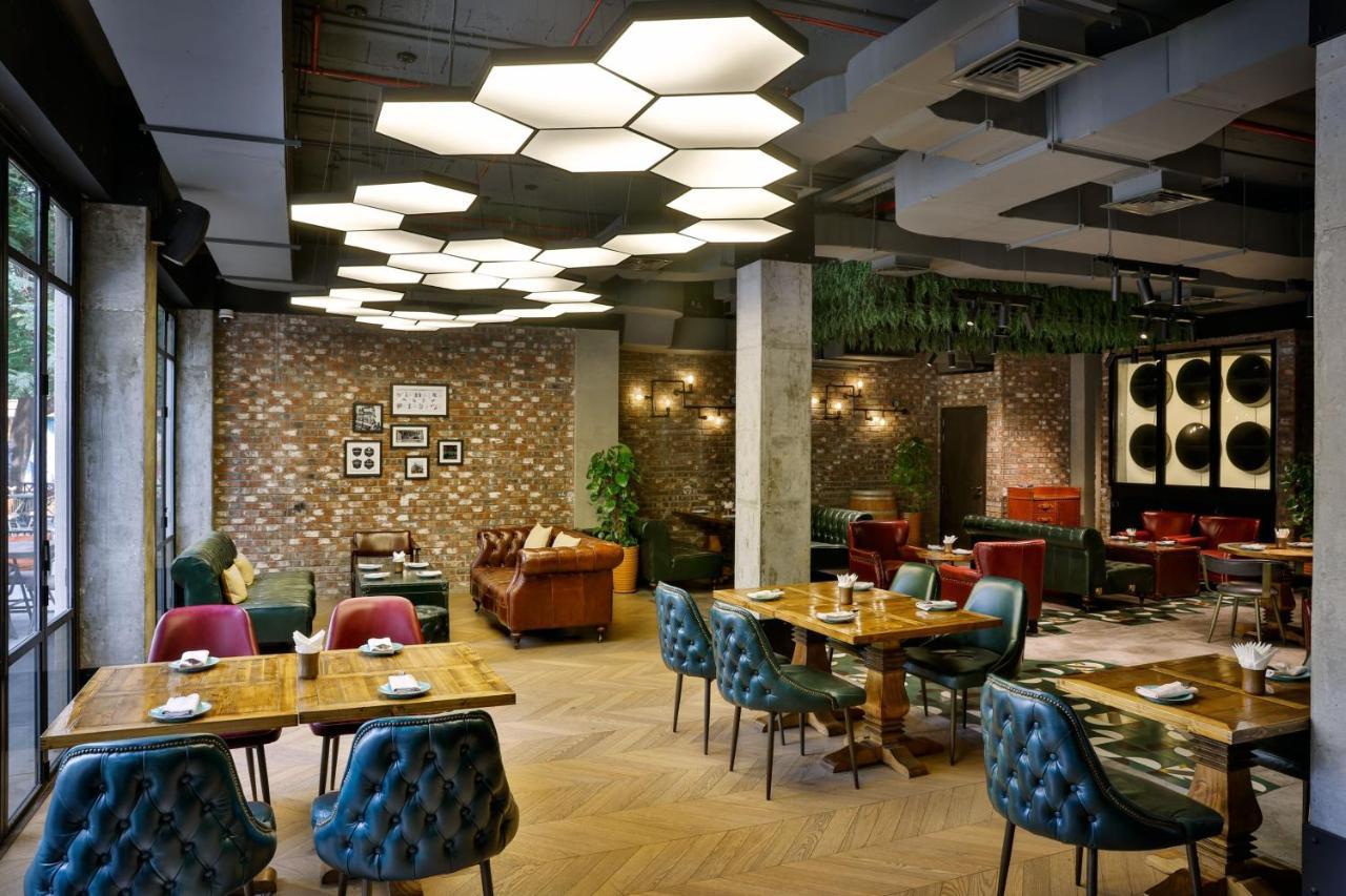 เลอ เมริเดียน ดูไบ โฮเต็ล แอนด์ คอนเฟอเรนซ์ เซ็นเตอร์ Hotel ภายนอก รูปภาพ The interior of the restaurant